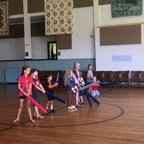 A team of home schoolers play boffing games.