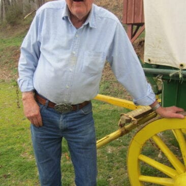 J. Garrett with Carver Covered Wagon